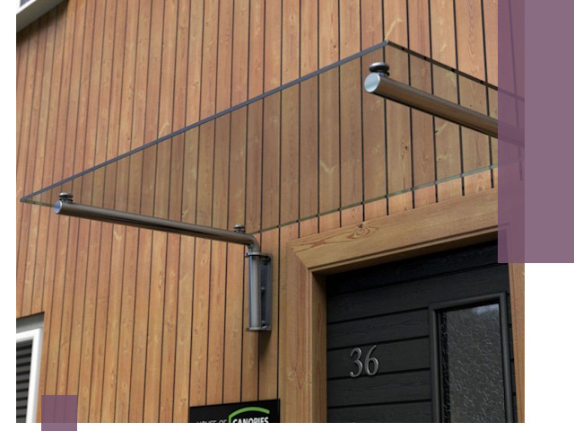 Стеклянные козырьки на входы и фасады в Артёме